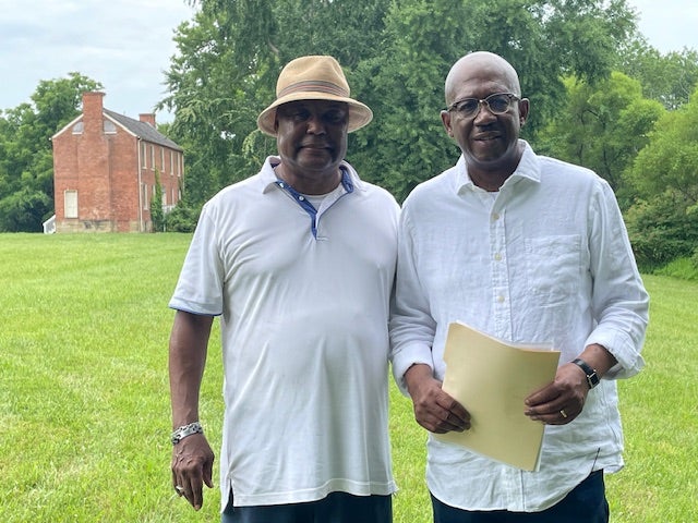 Photo: Pierre Thomas and Dr. Cicero Fain at the Jenkins Plantation.