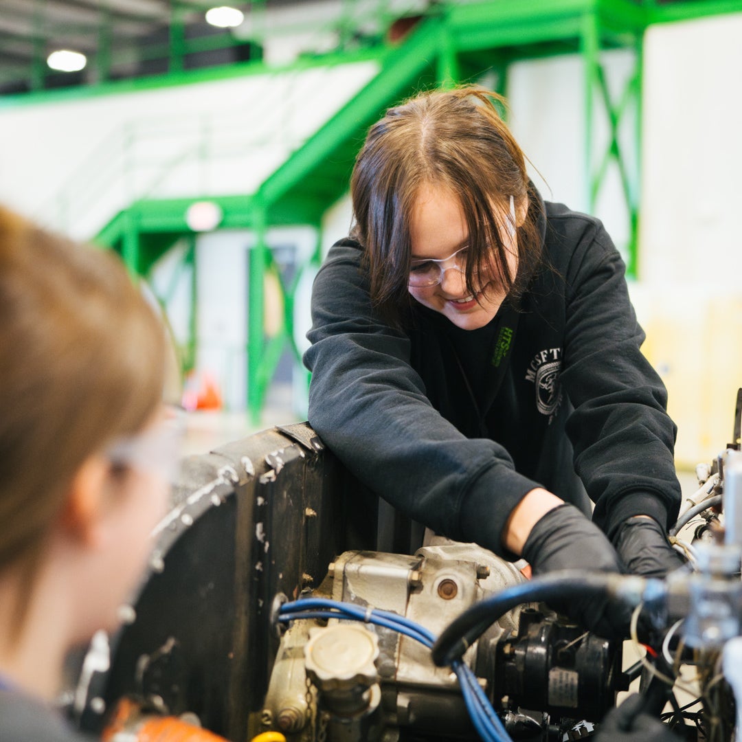 Marshall University Aviation Maintenance Technology students works on an aircraft