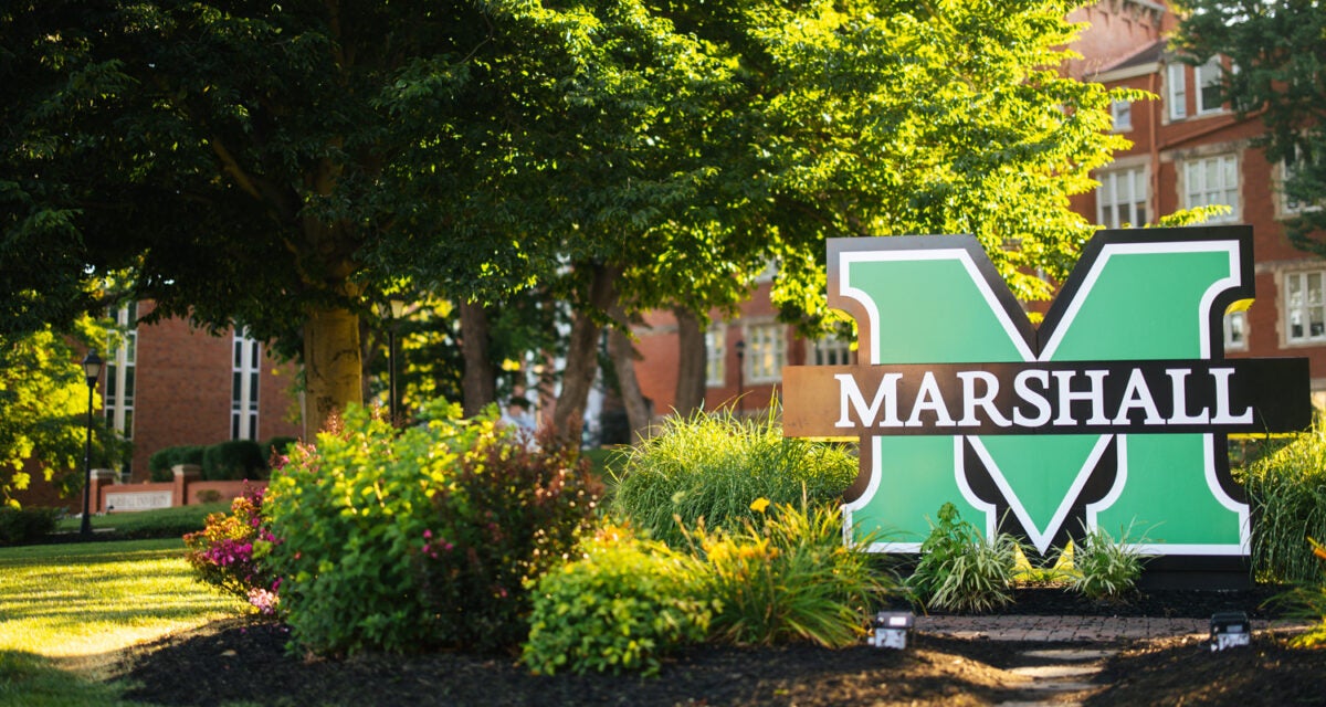 Marshall sign in front of Old Main on Marshall University's Huntington campus