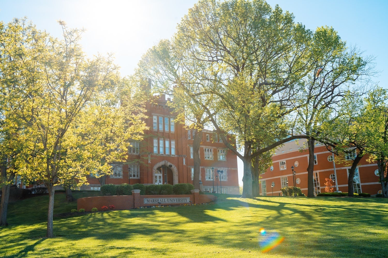 spring photo of the exterior of Old Main