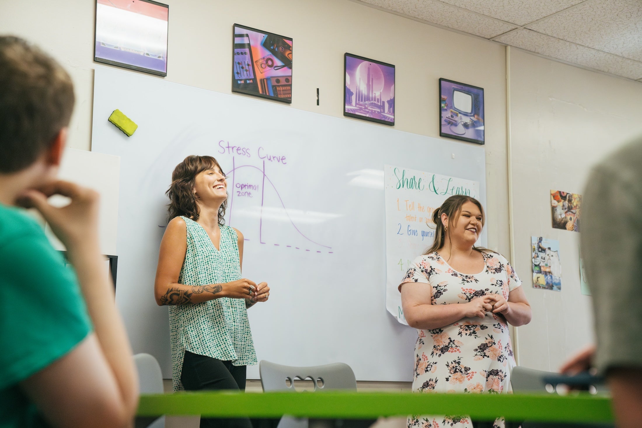 two staff instructors leading class