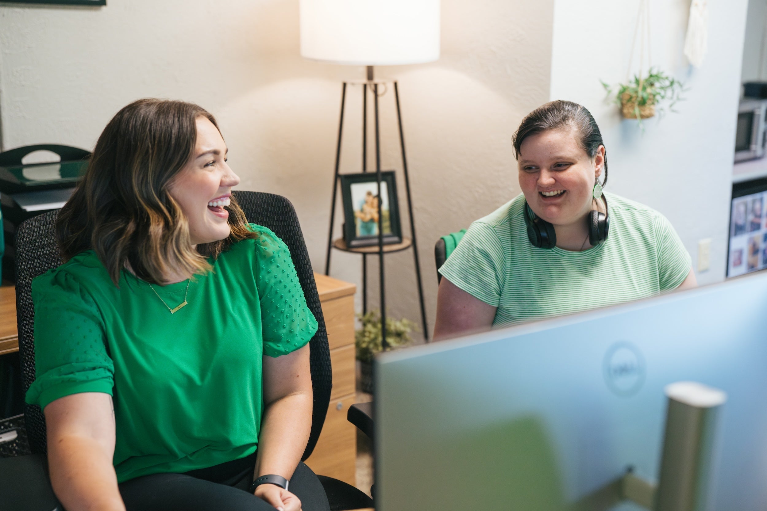 a college program staff member helping a student