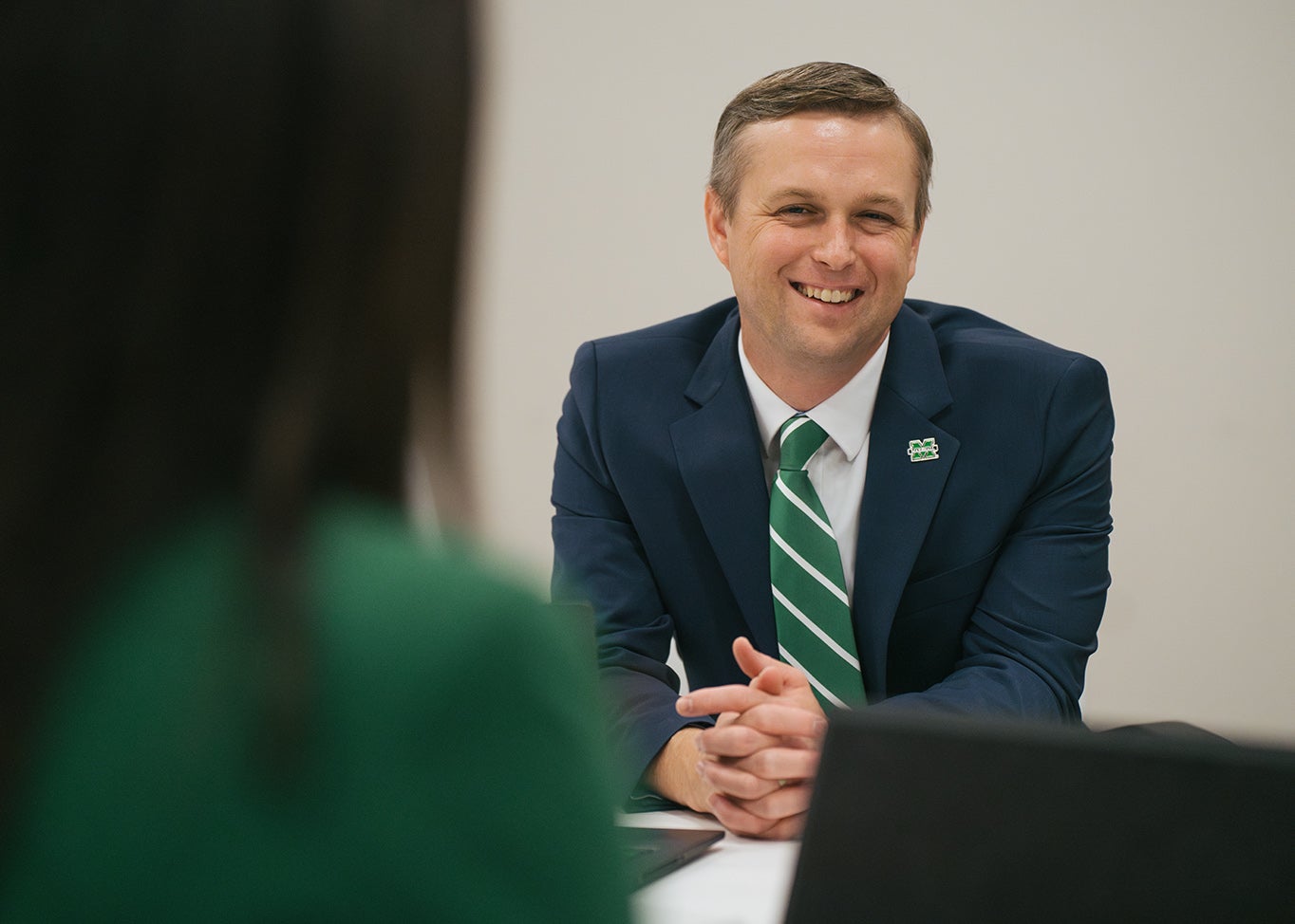 Marshall University's Brandon Dennison speaks during a meeting.