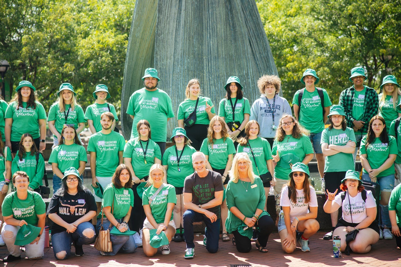 Marshall for All students gather in front of the Memorial Fountain for a group photo with President Brad D. Smith