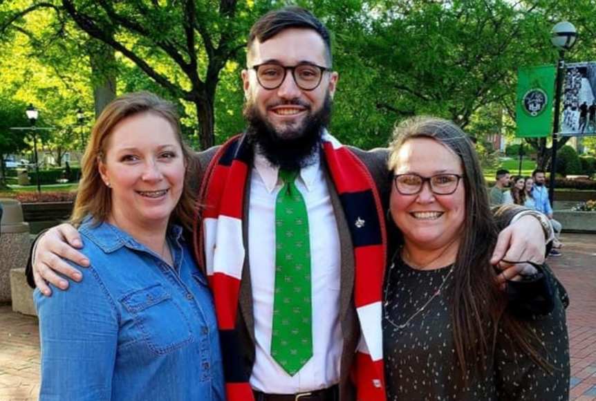 Cody Stiltner pictured with Bonnie Bailey (left) and his mother on Marshall University's Memorial Student Center Plaza