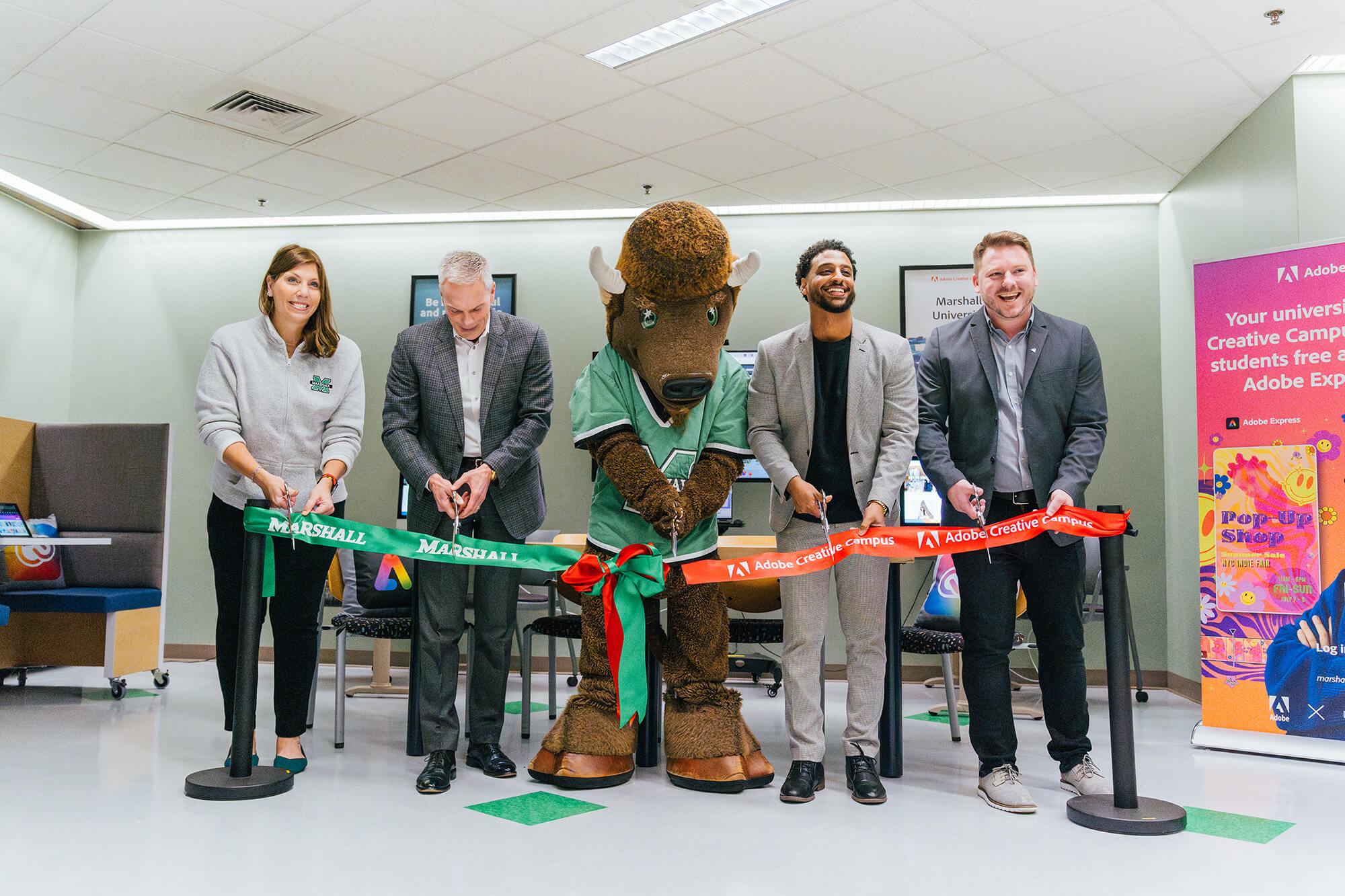 Marshall University and Adobe staff cut ribbon to new Co-Lab space in Drinko Library