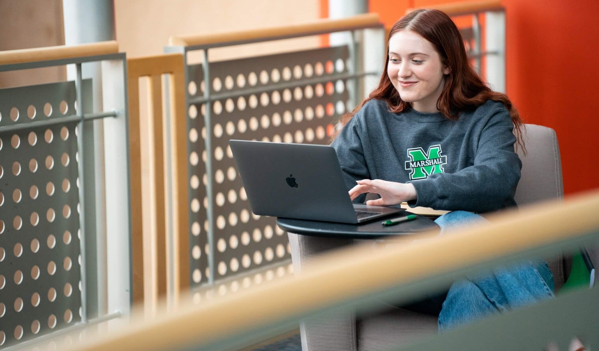 student working on a laptop