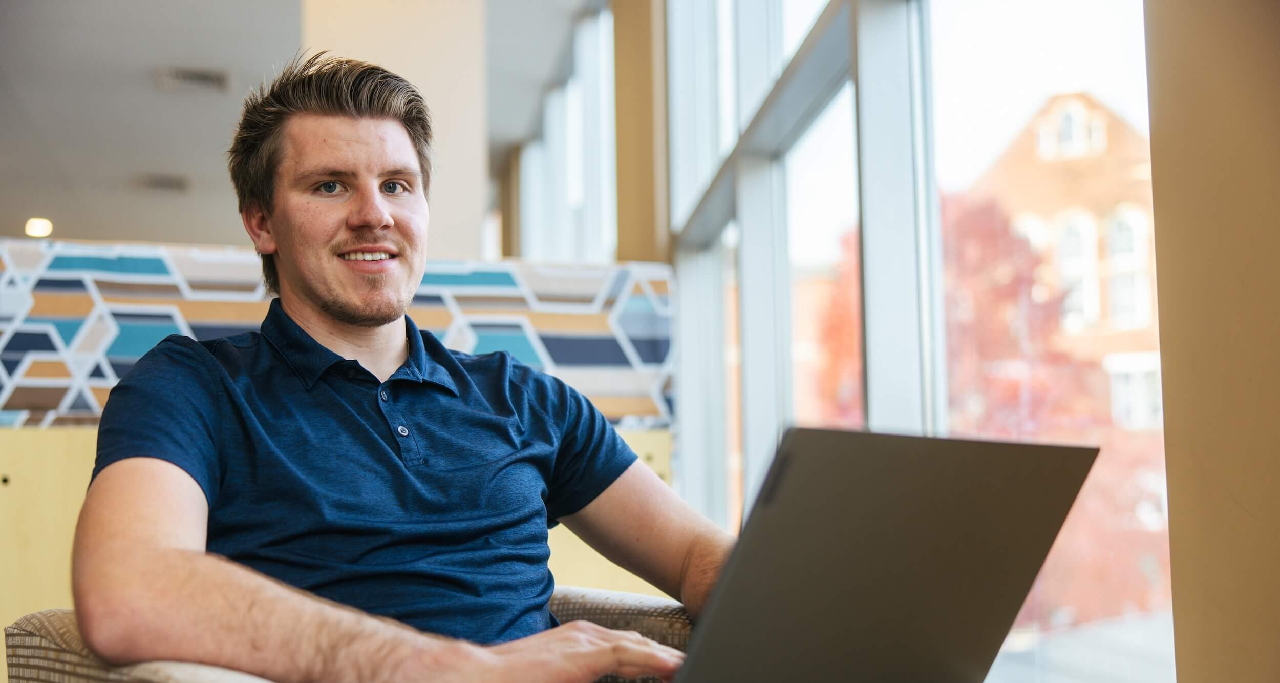 student working on a laptop