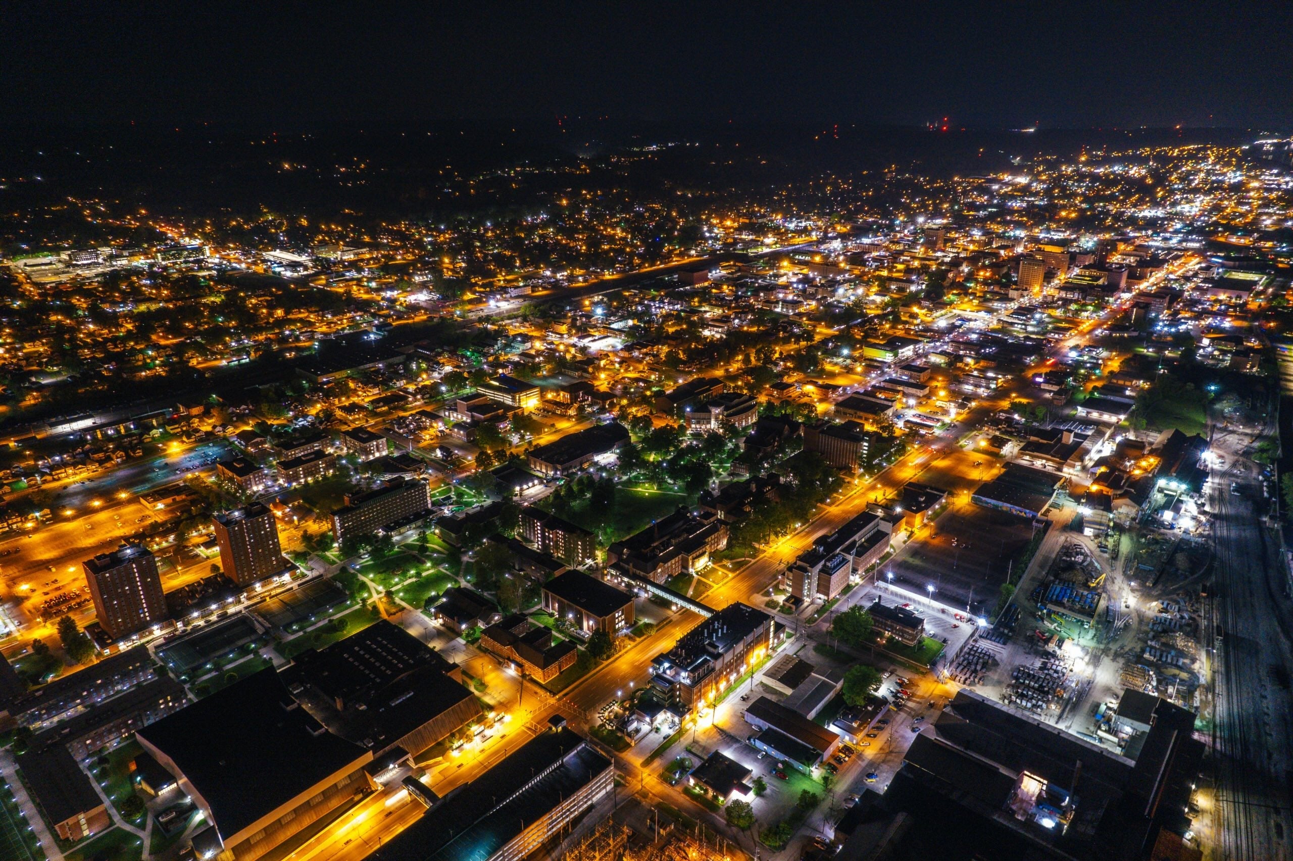 drone shot of City of Huntington at night