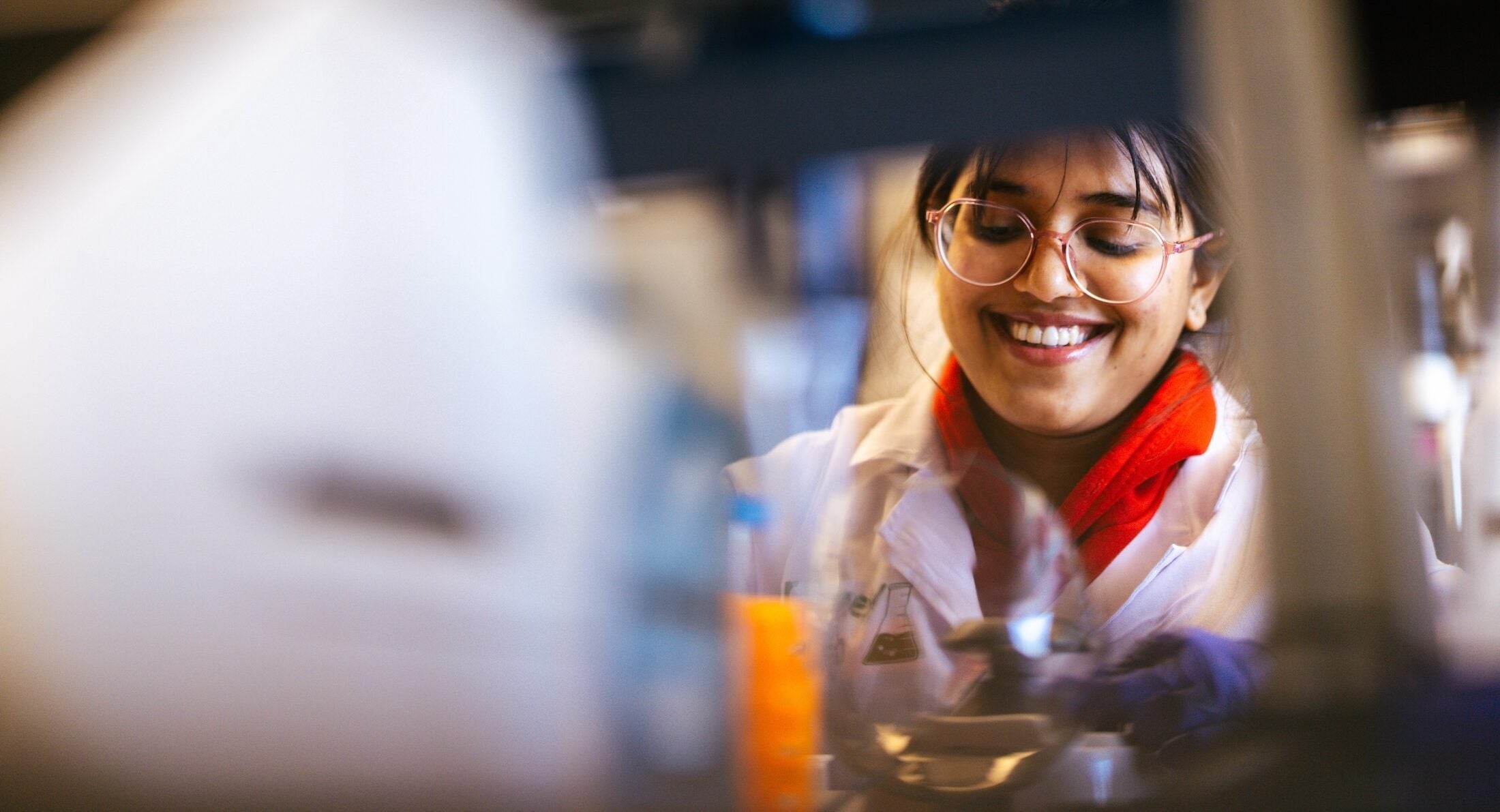 female pharmacy student working in lab
