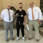 picture of nick adams and craig kimble with a student preceptor
