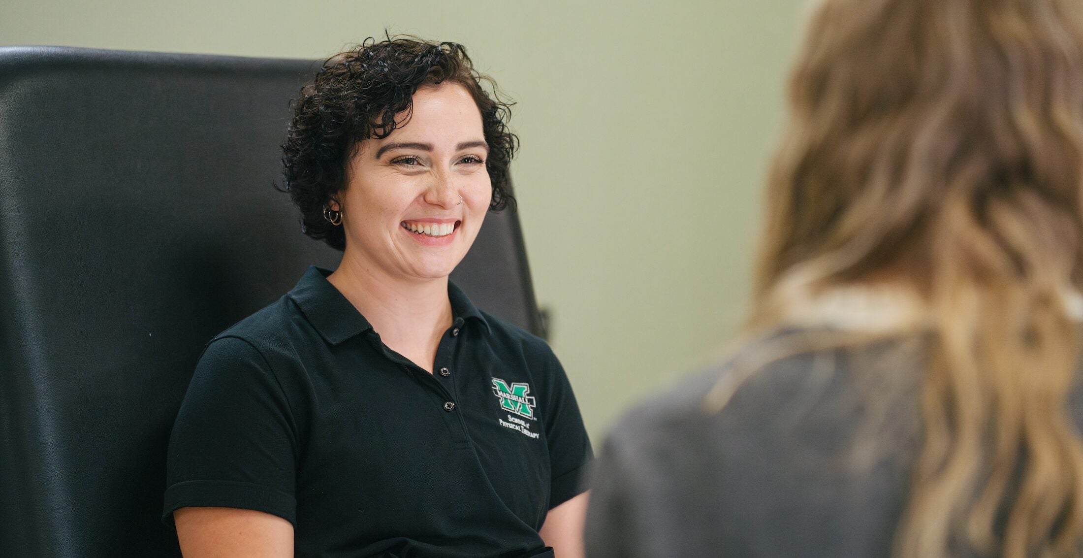 School of Physical Therapy student interacting with a professor