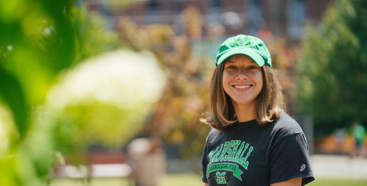 student smiling on campus