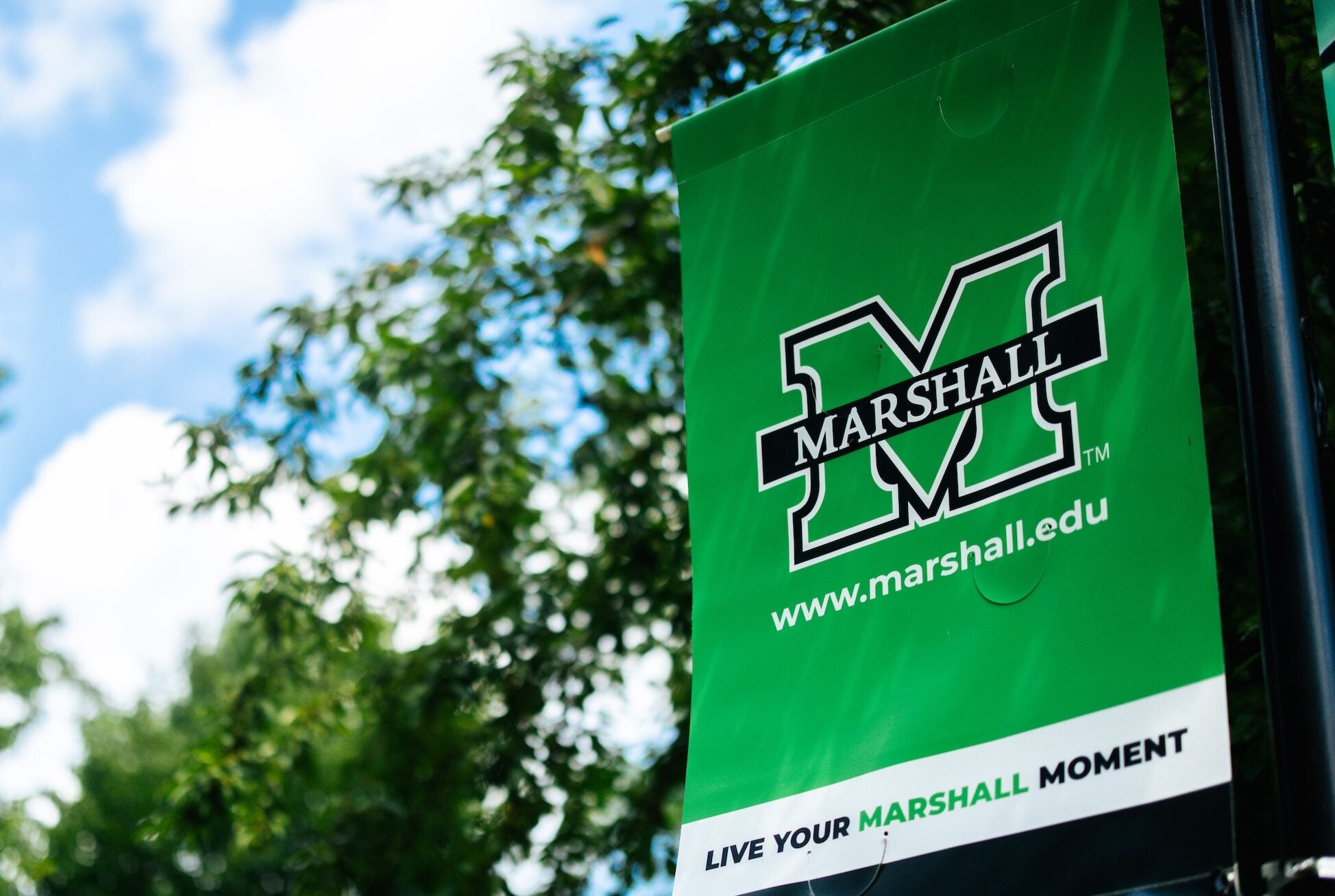 Marshall pole banner on campus