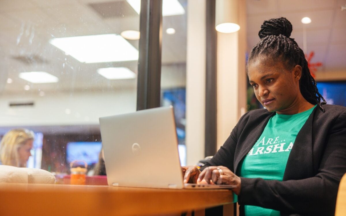 student working on a laptop