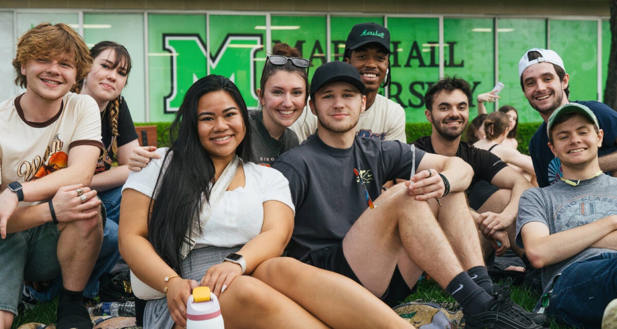 Students gather for a group photo on Marshall University's Buskirk Field